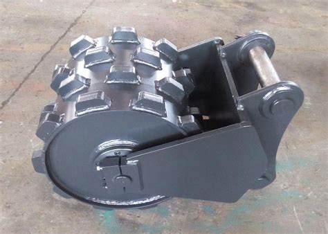 compact wheeled excavators|compactor wheel for excavators.